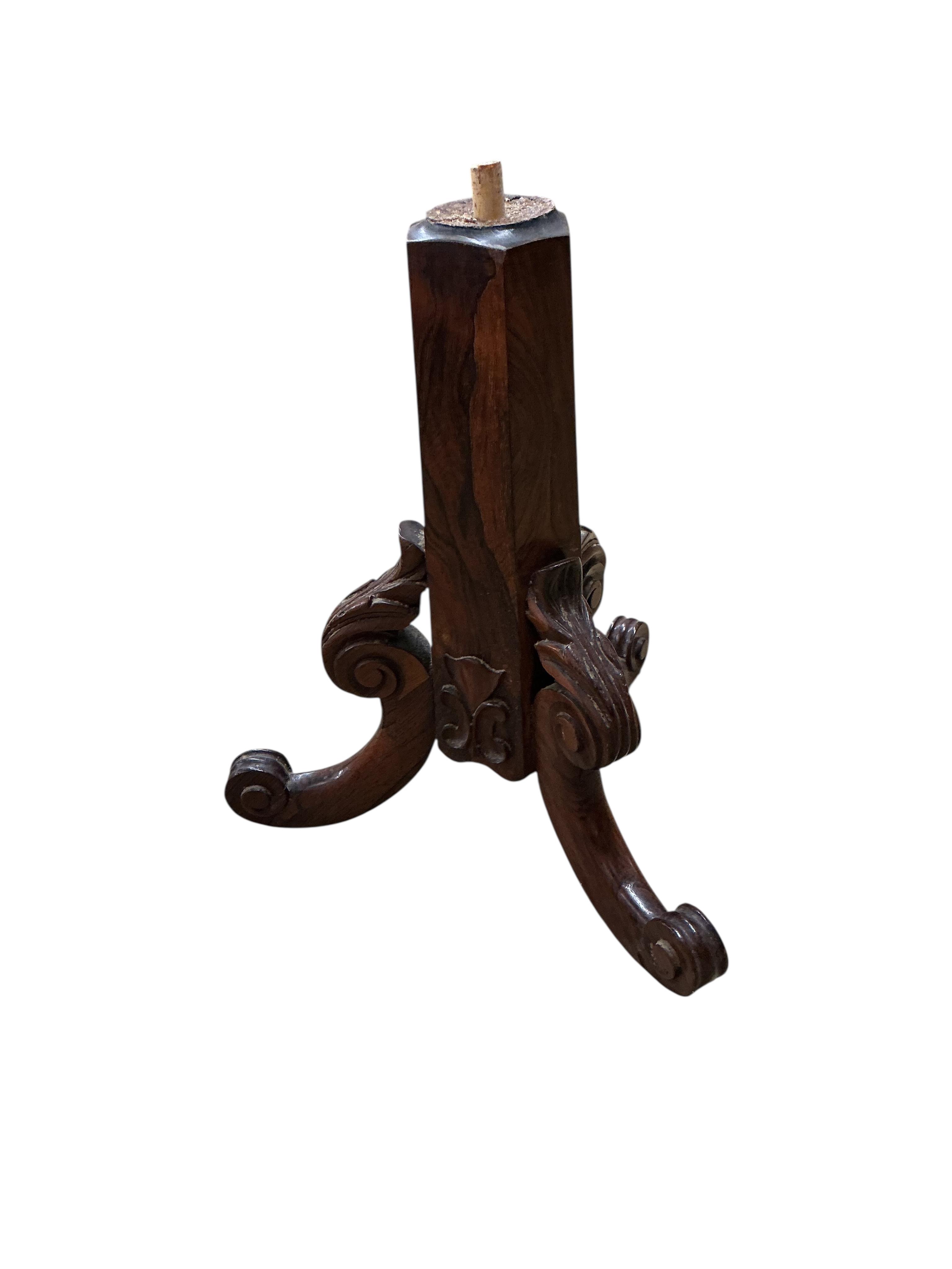 A Regency rosewood sarcophagus tea caddy, on associated stand